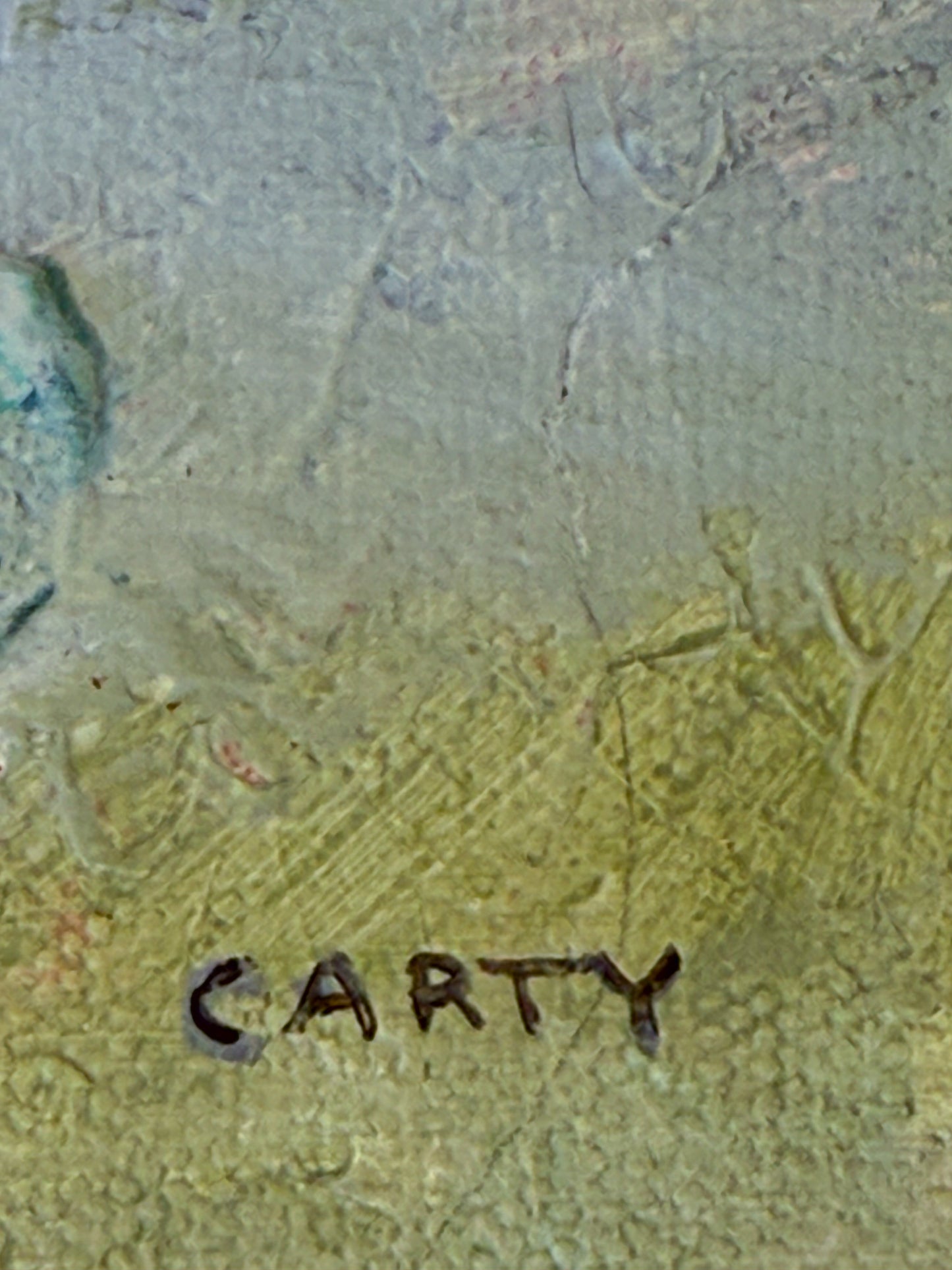 Signature 'CARTY' on a textured surface