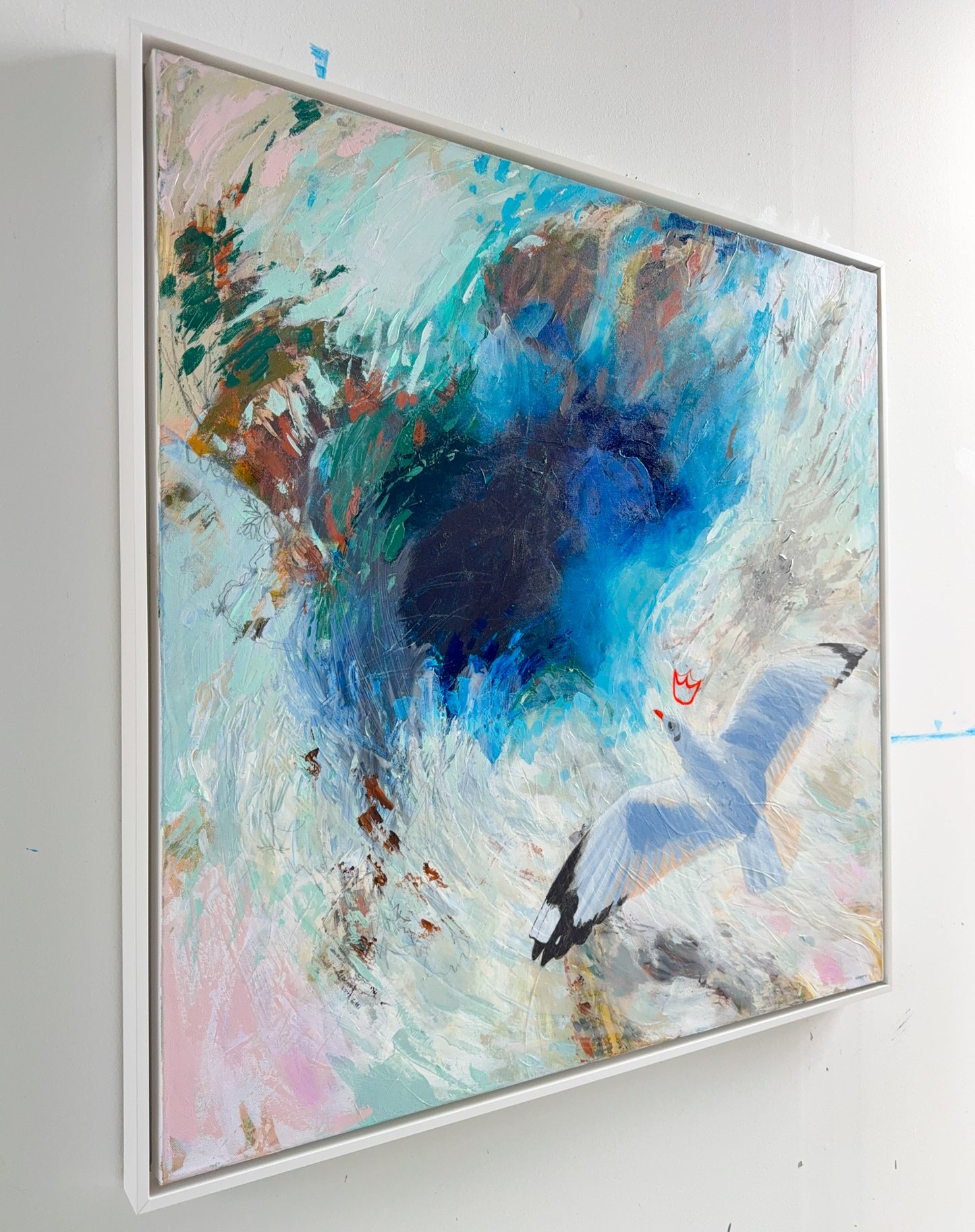 Abstract painting with flying seagull by New England artist Megan Carty on a white wall