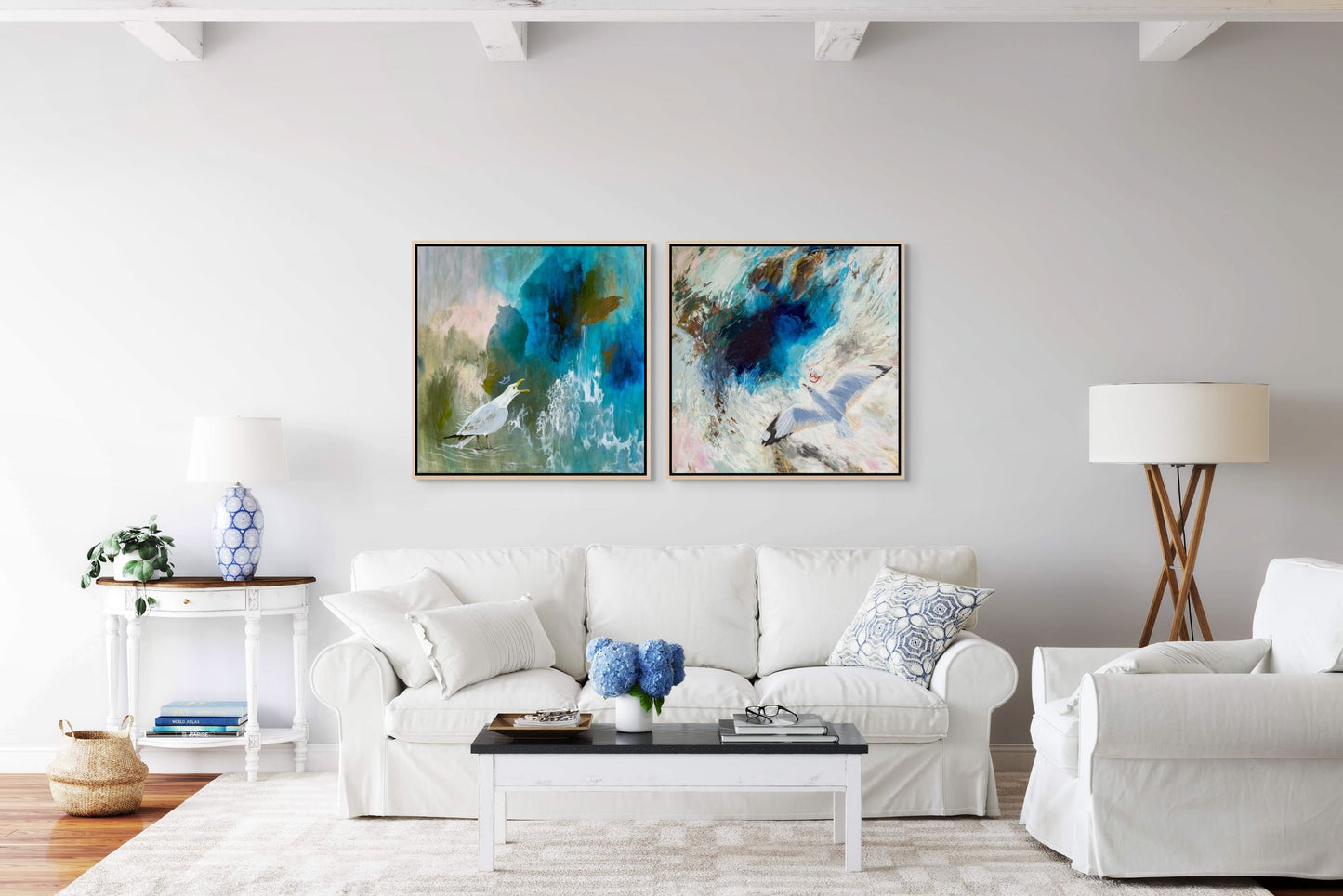 Modern living room with white furniture and blue abstract bird wall art, perfect for coastal decor or beach house decor.