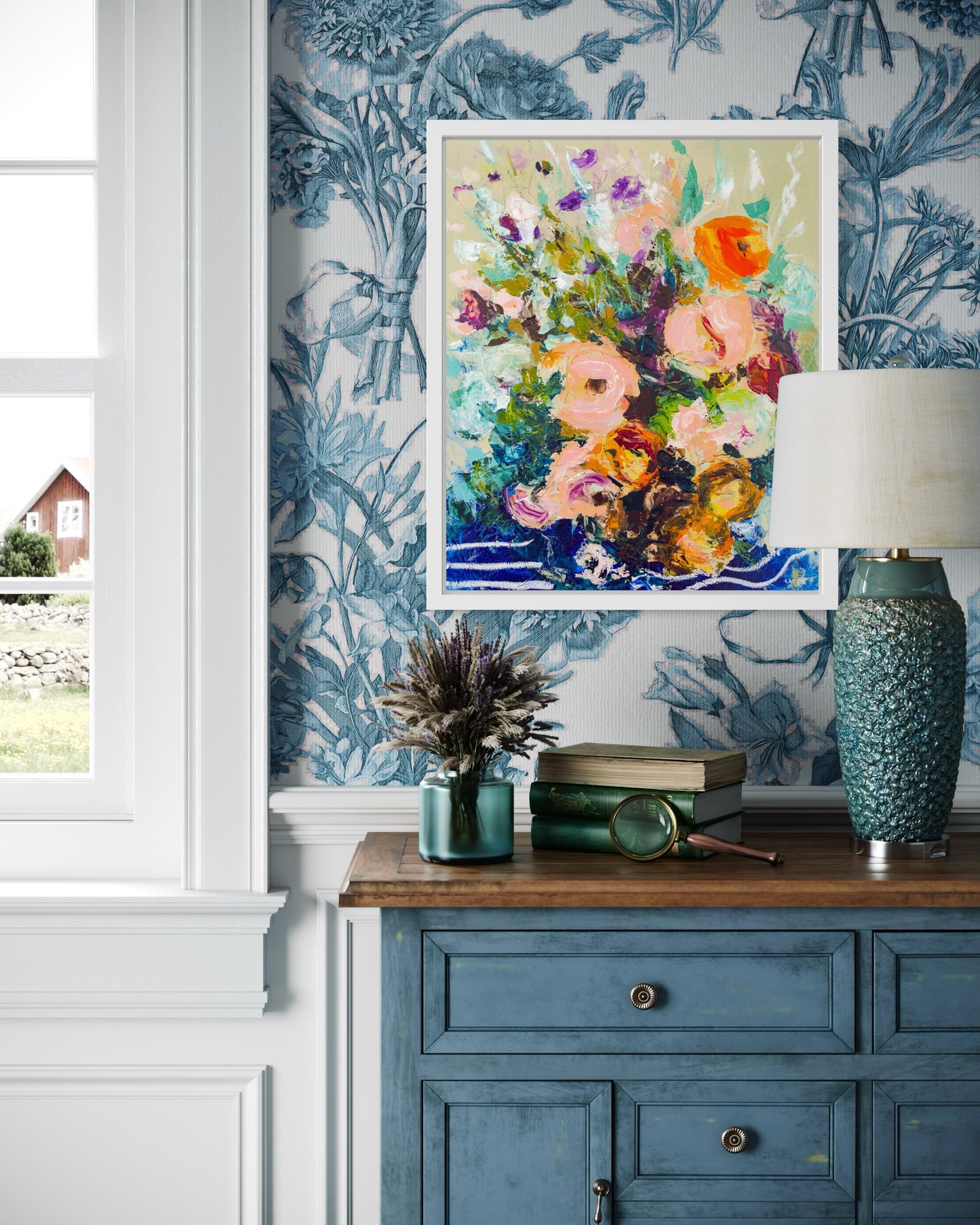 Abstract floral painting painted by Boston area artist Megan Carty on a floral blue wallpaper over a blue storage dresser with blue accessories. 