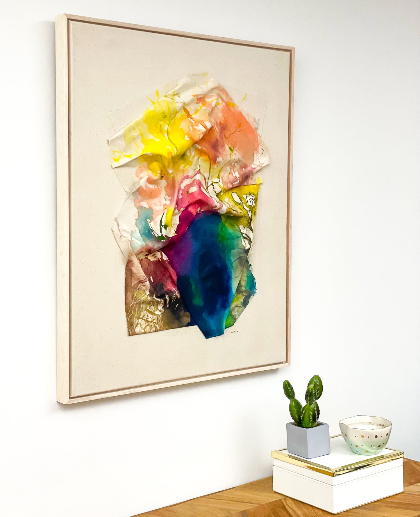 The colors of New England terrain are rich, plentiful, and unlike anywhere else. Meditate and unwind with this chic sculptural abstract landscape painting in warm fall colors of Acadia by Megan Carty.