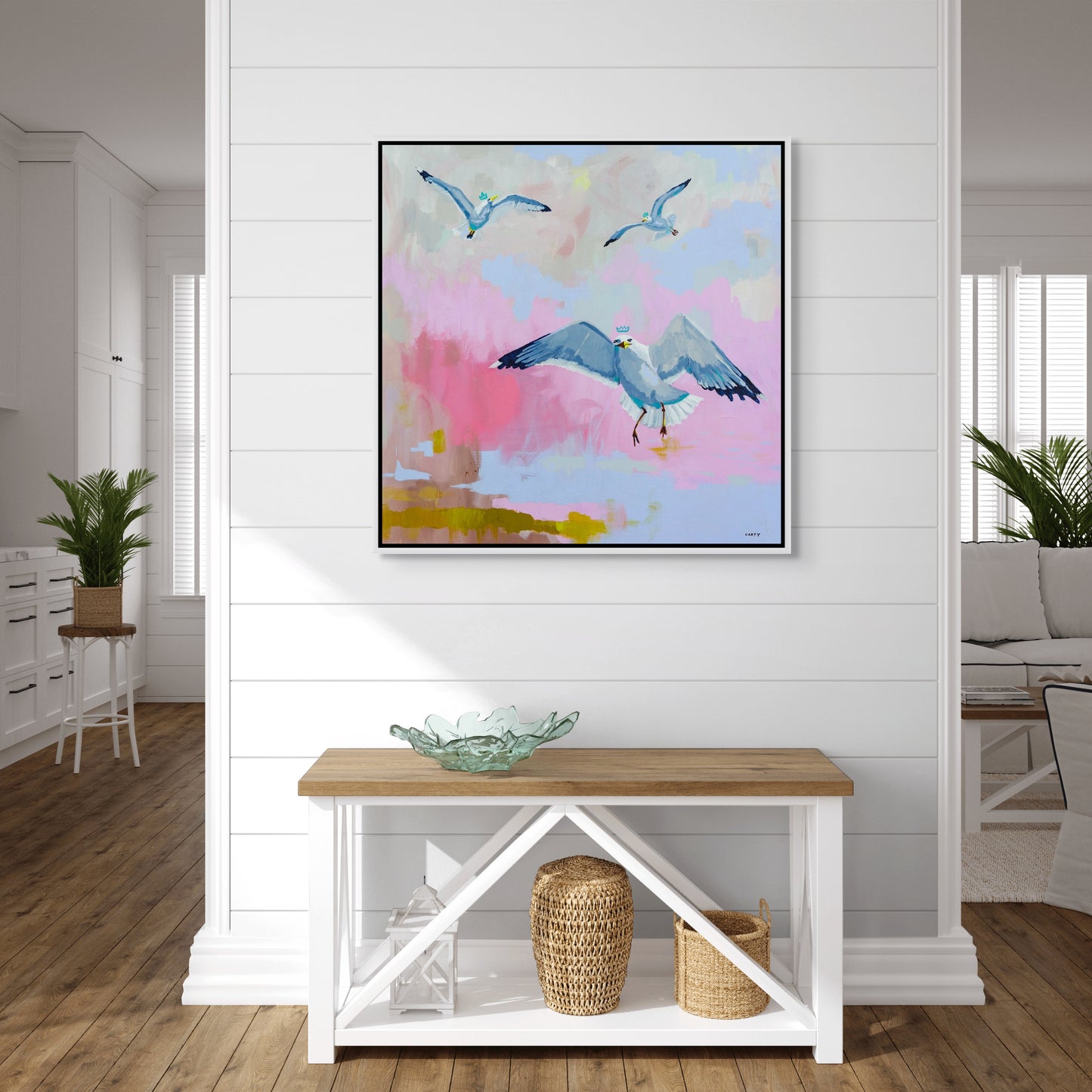 Colorful abstract painting of seagulls by Megan Carty in a modern beach house coastal living room.